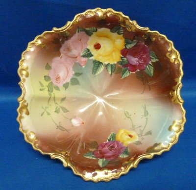 ANTIQUE NIPPON HP BOWL W/ ROSES: ANTIQUE NIPPON HP BOWL W/ ROSES approx 8" diameter;3" tall;circa 1910;excellent condition we can recommend local shippers
