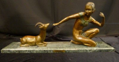 DEMETRE CHIPARUS "DECO WITH FAWN": DEMETRE CHIPARUS "DECO WITH FAWN" approx 33" long;bronze on green marble plith;after Chipaus we can recommend local shippers