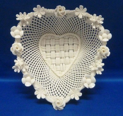 IRISH BELLEEK FLORAL HEART BASKET: IRISH BELLEEK FLORAL HEART BASKET approx 6" diameter; mint condition we can recommend local shippers