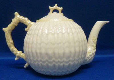LARGE GREEN MARK BELLEEK TEAPOT: LARGE GREEN MARK BELLEEK TEAPOT basket weave design; with green handle and finial; standing 6.5" tall;10" wide we can recommend local shippers