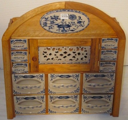 Old wooden spice rack with hand painted blue and w: Old wooden spice rack with hand painted blue and white drawers. Size 23.5" Wide x 21" Tall