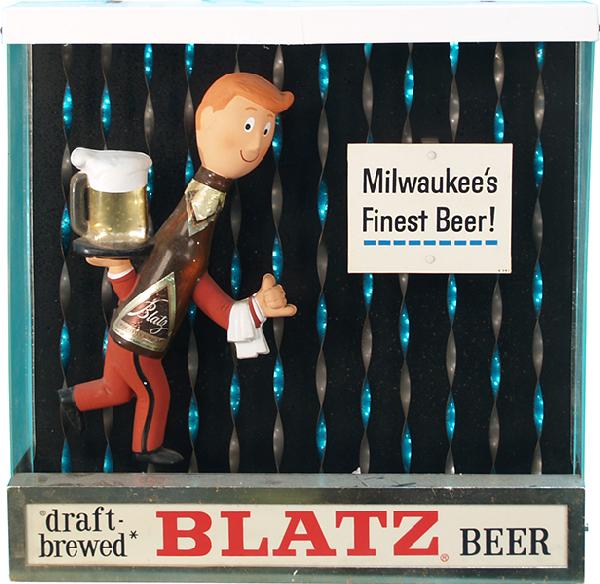 Lot Of 2 Blatz Beer Advertisement Motion Signs:: Lot Of 2 Blatz Beer Advertisement Motion Signs: 1 - Blatz Beer guy on unicycle riding around barrel & 1 - Blatz Beer guy w/ colorful moving background
