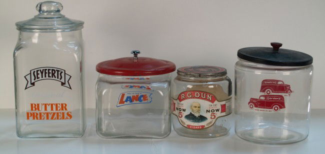 Lot Of 4 Early Country Store Countertop Glass Conta: Lot Of 4 Early Country Store Countertop Glass Containers: 1 - R.E. Dun Cigars, 1 - Gordon's, 1 - LANCE & 1 - Seyfert's, all w/ lids