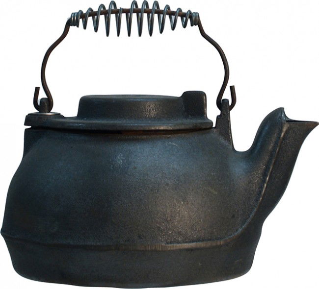 Early Cast-Iron Tea Kettle: Early Cast-Iron Tea Kettle by Wagner Ware Made In USA. in original condition