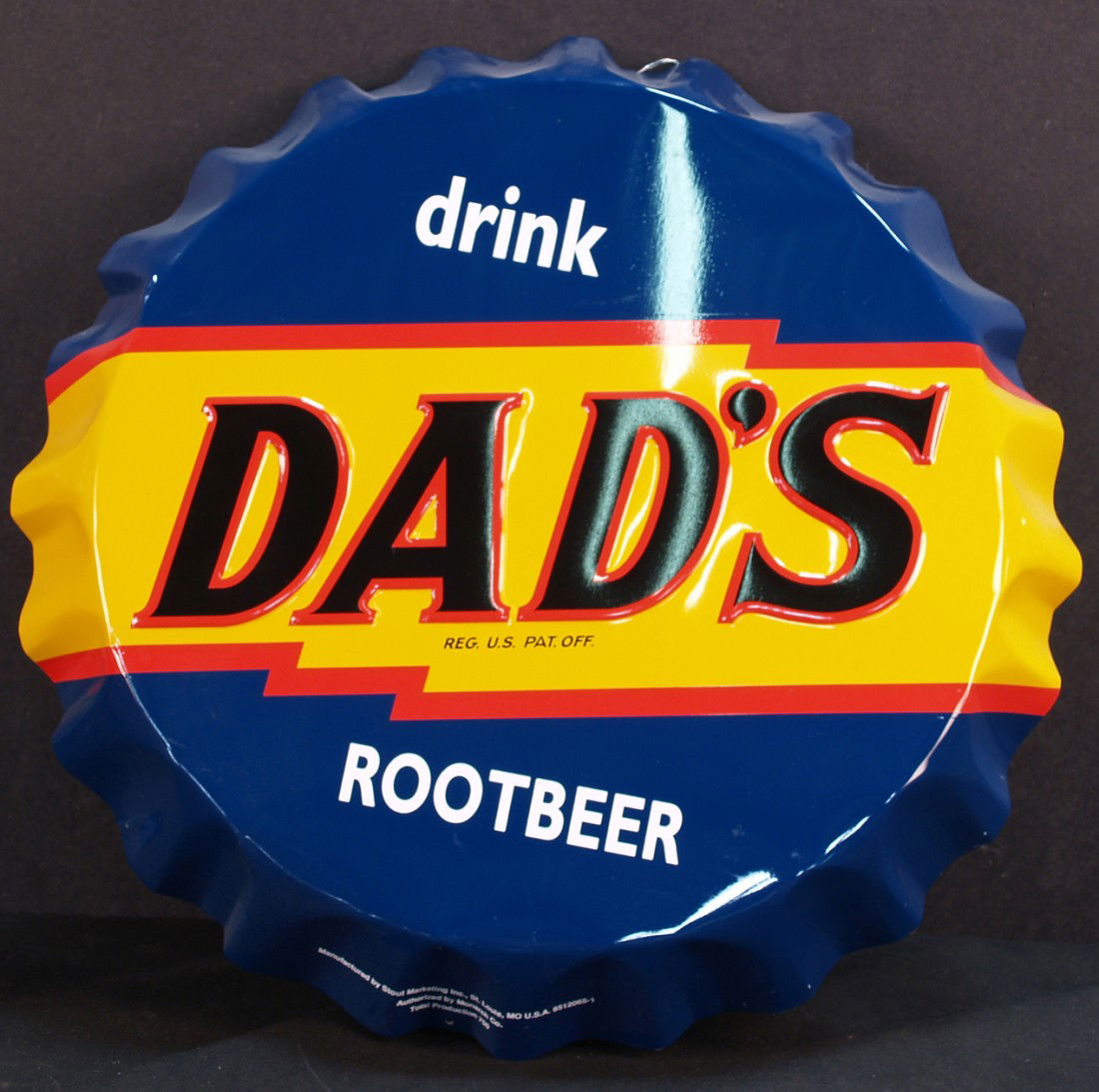 Dad's Root Beer Embossed Bottle Cap Shape Tin Sign: Dad's Root Beer Embossed Bottle Cap Shape Tin Sign by Stout Marketing Inc. St. Louis, MO. - 21" diam