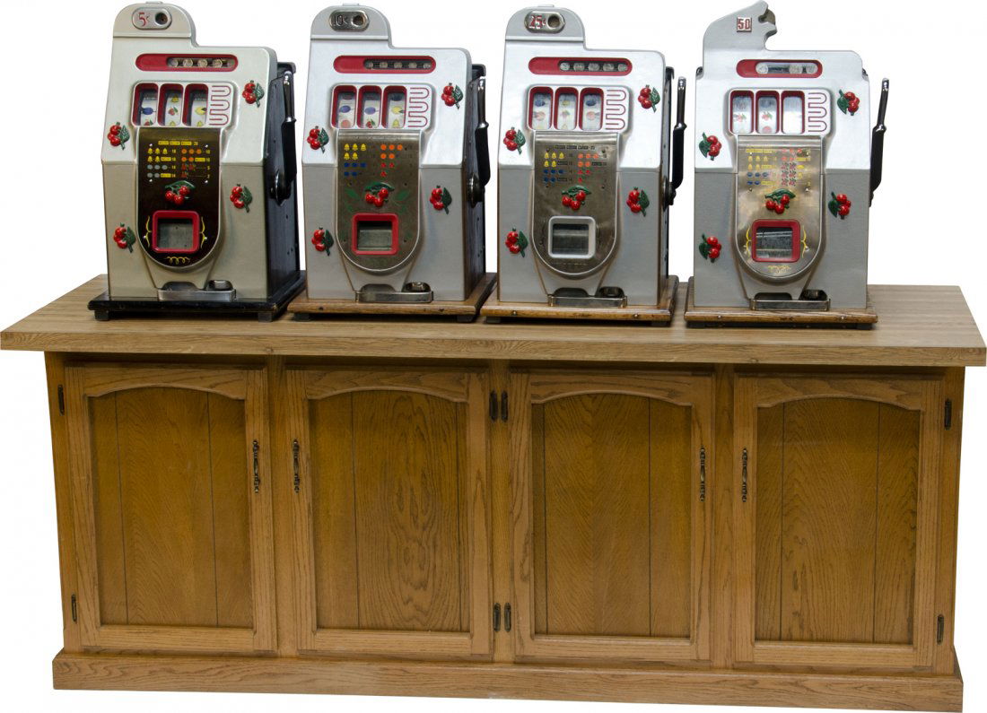 Lot Of 4 Mills Novelty Black Cherry Slot Machines: Lot Of 4 Mills Novelty Black Cherry Slot Machines, c1936: 5, 10, 25 & 50 cent, each machine in working condition, w/ keys, on custom made wood stand