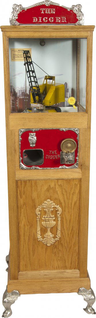 25 Cent "The Digger" Claw Arcade Machine w/ The Di: 25 Cent "The Digger" Claw Arcade Machine w/ The Digger Top Sign, floor model, c1930s Needs adjustments