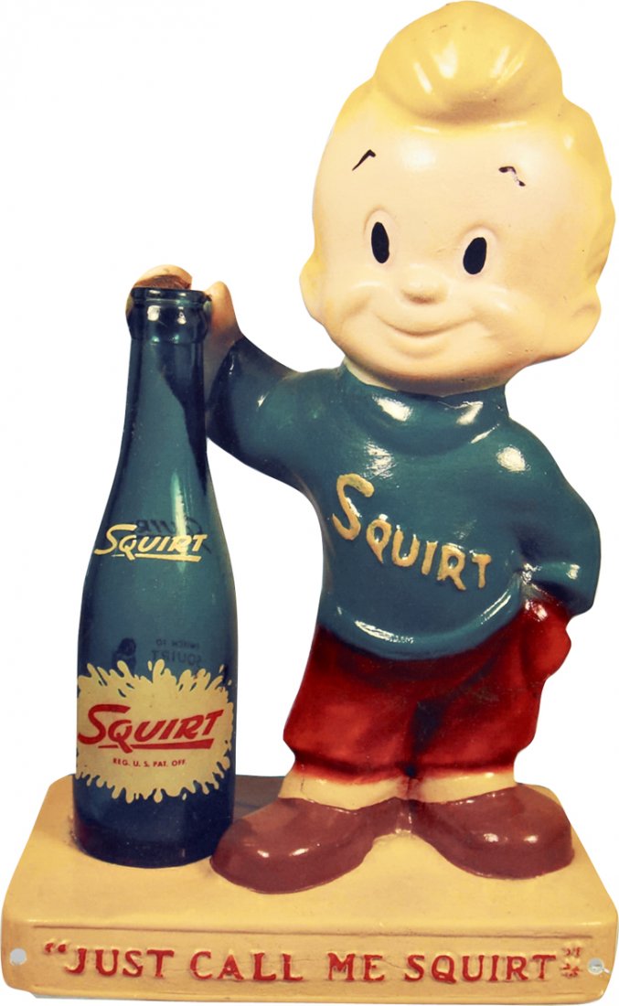 Squirt Die-Cut Porcelain Advertisement Sign: Squirt Die-Cut Porcelain Advertisement Sign featuring little boy and bottle, "Just Call Me Squirt", Excellent condition - 16" x 10"