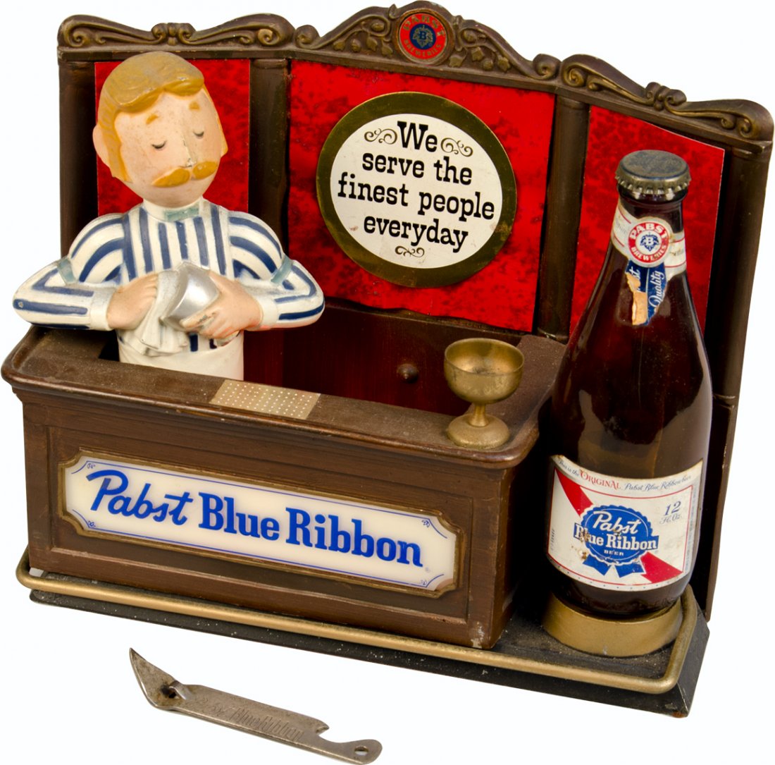 Lot of 2 Pabst Blue Ribbon Items:: Lot of 2 Pabst Blue Ribbon Items: 1 - Pabst Blue Ribbon Metal Countertop Advertisement Light-Up Display w/ Bottle featuring bar and bartender, "We Serve the Finest People Everyday" - 12" x 10"h & 1 - 