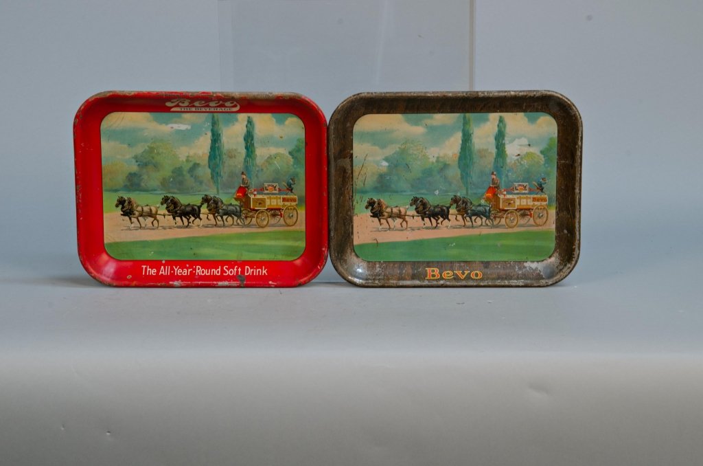 Lot Of 2 Tin Bevo Advertisement Serving Trays:: Lot Of 2 Tin Bevo Advertisement Serving Trays: 1 - "Bevo The Beverage - The All-Year-Round Soft Drink", Anheuser-Busch, Red border & 1 - Bevo copyrighted Anheuser-Busch, Brown border, Both featuring h