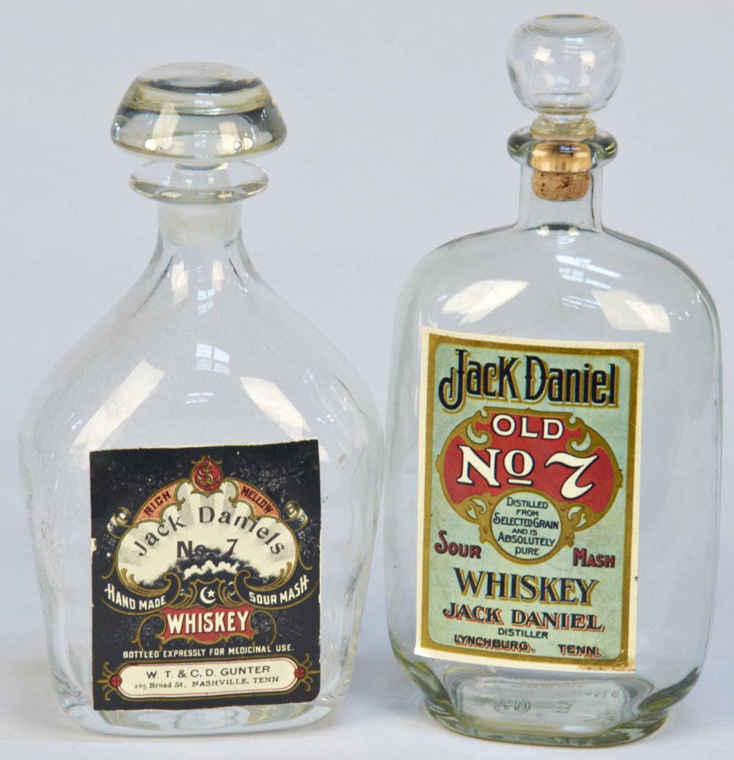 Lot of 2 Early Jack Daniels No. 7 Whiskey Glass Liquor: Lot of 2 Early Jack Daniels No. 7 Whiskey Glass Liquor Bottles w/ paper labels and stoppers, "Bottled Expressly for Medicinal Use"