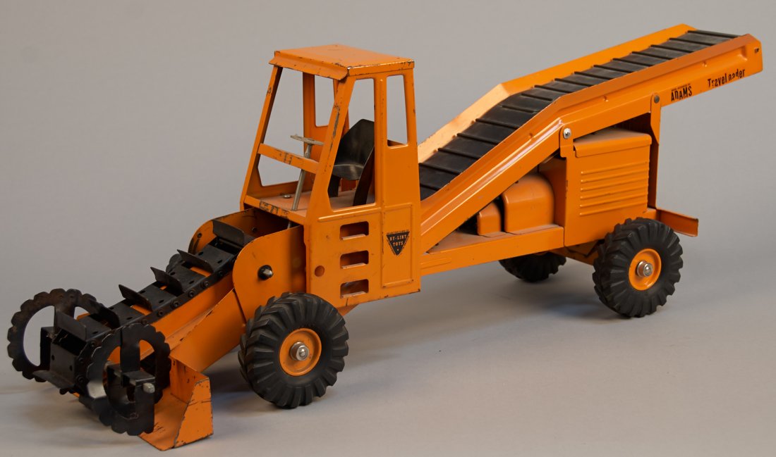 Ny-Lint Adams Traveloader Heavy Construction Trailer: Ny-Lint Adams Traveloader Heavy Construction Trailer Ny-Lint Tool & Mfg. Rockford, Illinois U.S.A. This metal Adams Traveloader is designed to have the front and back conveyors move when you turn the 
