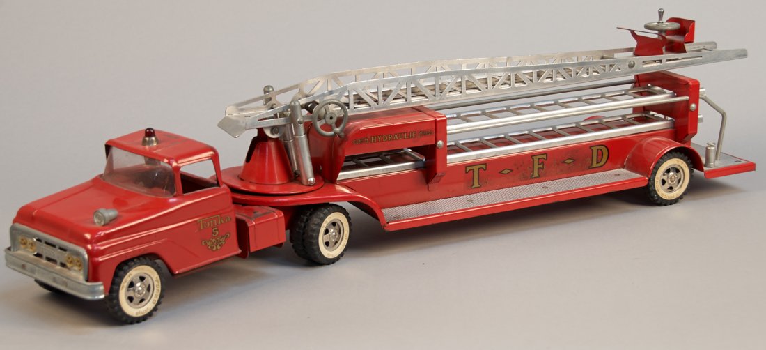Tonka Fire Department Aerial Ladder Truck: Tonka Fire Department Aerial Ladder Truck Tonka Toys, U.S.A. Hydraulic ladder truck with two extra ladder segments. 35" long. Good original condition.
