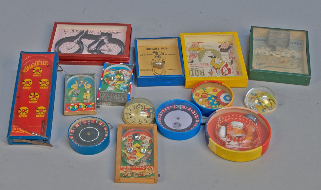 Lot of 14 - Vintage Misc. Hand-Held Skill/Puzzle Games: Lot of 14 - Vintage Misc. Hand-Held Skill/Puzzle Games, Including: "Hungry Pup", Made in USA, "Cootie Game", Made in USA, "La Bicyclette" Made in Germany, "Golden Rod Puzzle" Made in England, etc.