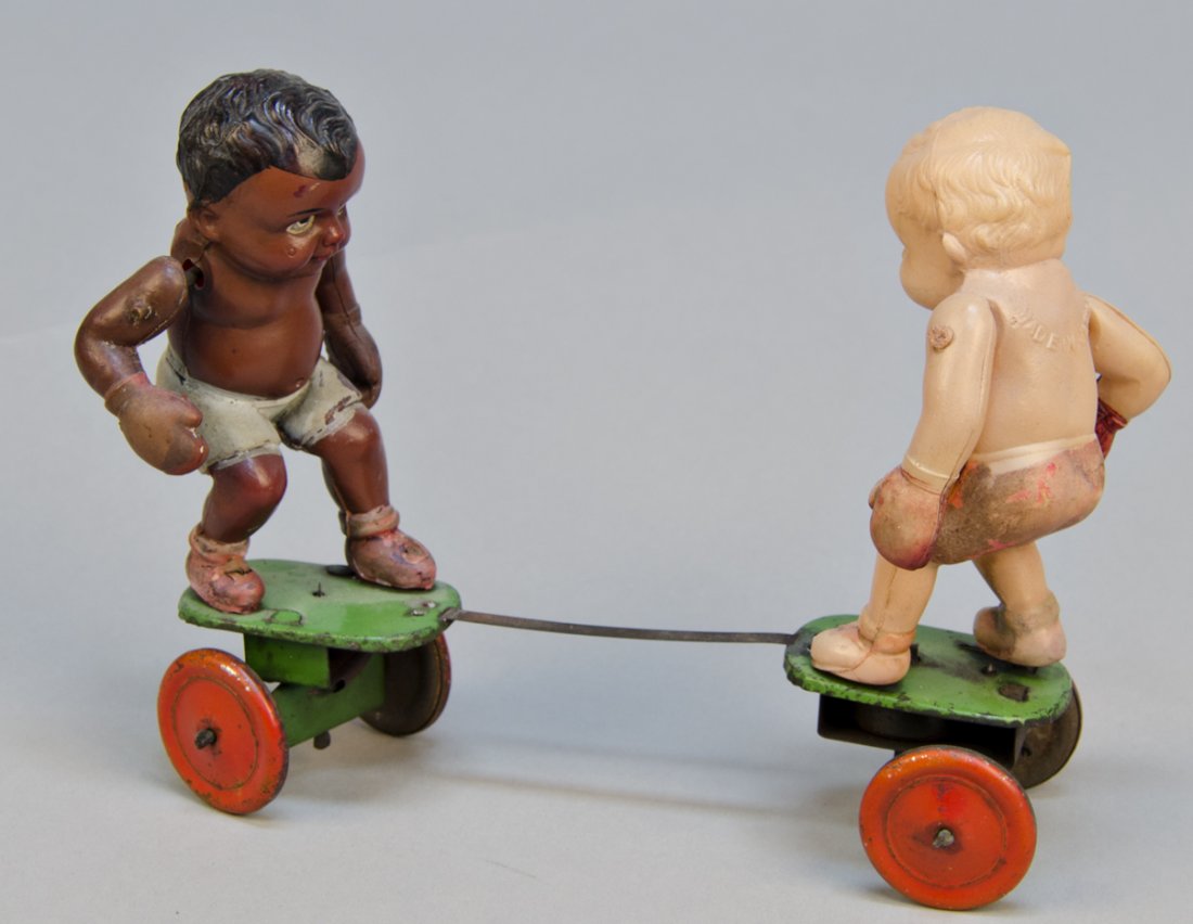 Boxing Celluloid Wind-Up Toy: Boxing Celluloid Wind-Up Toy, Made In Occupied Japan c1945-1952, boxing figures on tin base w/ wheels - 6"l., in excellent condition