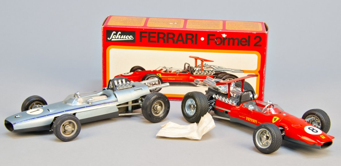 Lot Of 2 - Vintage Schuco Race Cars: Lot Of 2 - Vintage Schuco Race Cars, Made In Western Germany: 1 - Ferrari No. 8, Model No. 1073, c1970, litho. tin, wind-up w/ original Schuco key & wheel wrench, in excellent condition w/ O.B. & 1 -
