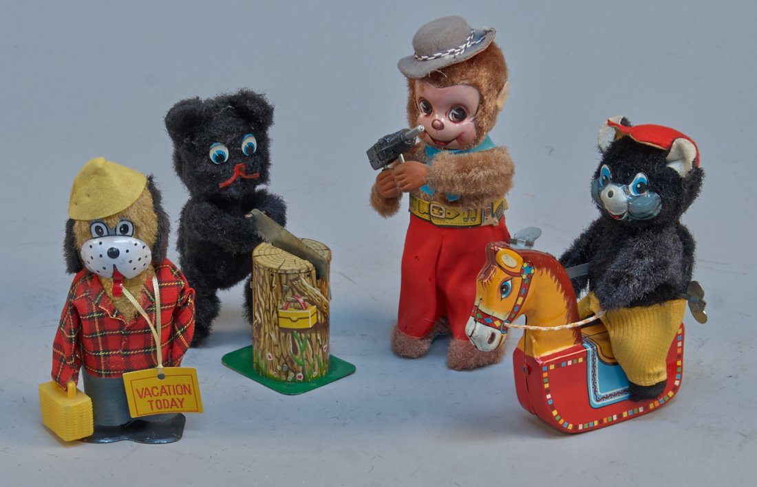 Lot Of 4 - Vintage Made In Japan Wind-Up Animal Toys:: Lot Of 4 - Vintage Made In Japan Wind-Up Animal Toys c1950's: 1 - black bear sawing at a tree stump, litho. tin, plush, 1 - vacationing dog w/ picnic basket, litho. tin, plush, fabric, 1 - black bear