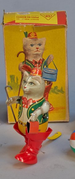 Puss In Boots: Puss In Boots, Made In Germany c1940s, litho. tin, wind-up - 5"h. In excellent condition w/ O.B.