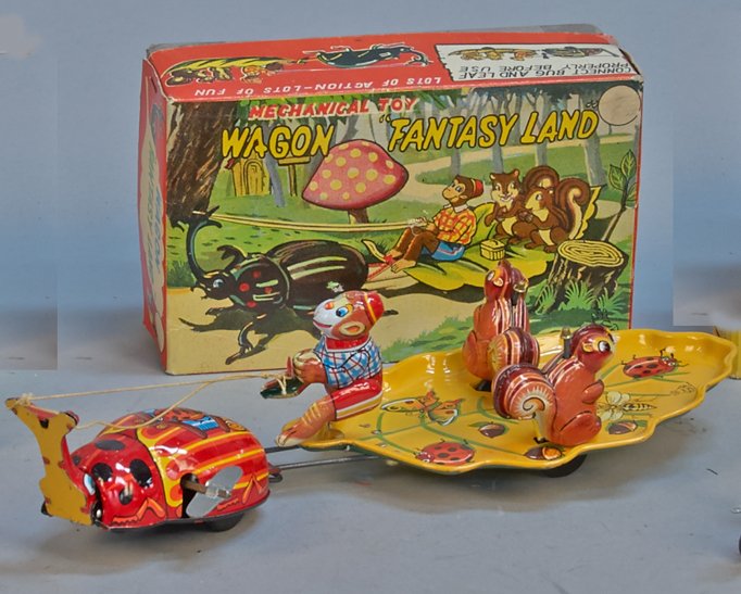 Mechanical Toy Wagon Fantasy Land: Mechanical Toy Wagon Fantasy Land, T.P.S., Japan c1960, litho. tin, rubber wheels, wind-up - 11-3/4"l. Beetle type bug pulling 2- squirrels on leaf wagon w/ monkey driver, in mint condition w/ O.B.