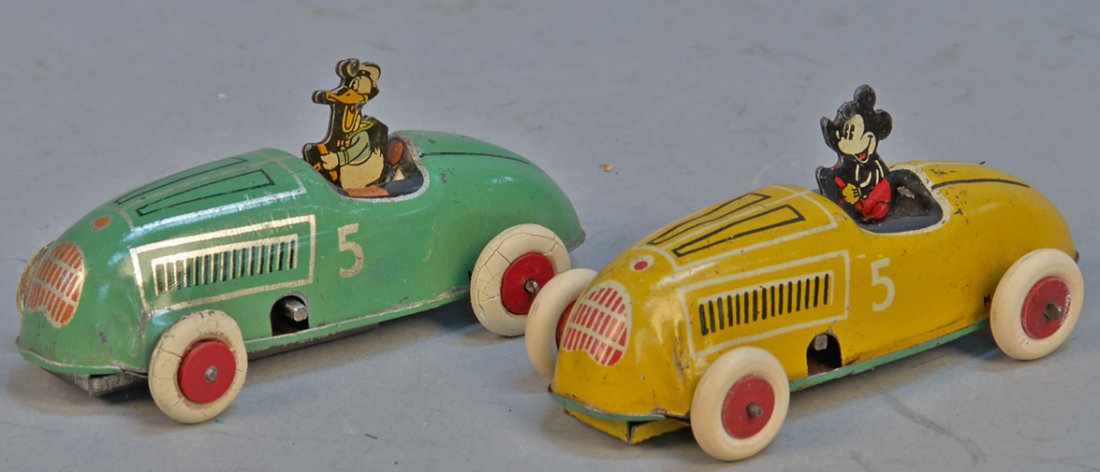 Lot Of 2 - Vintage Made In USA Walt Disney Litho. Tin W: Lot Of 2 - Vintage Made In USA Walt Disney Litho. Tin Wind-Up Race Cars, Lindstrom c1930: Mickey Mouse No. 5 (yellow) & Donald Duck No. 5 (green), both in excellent condition - 4"l. each
