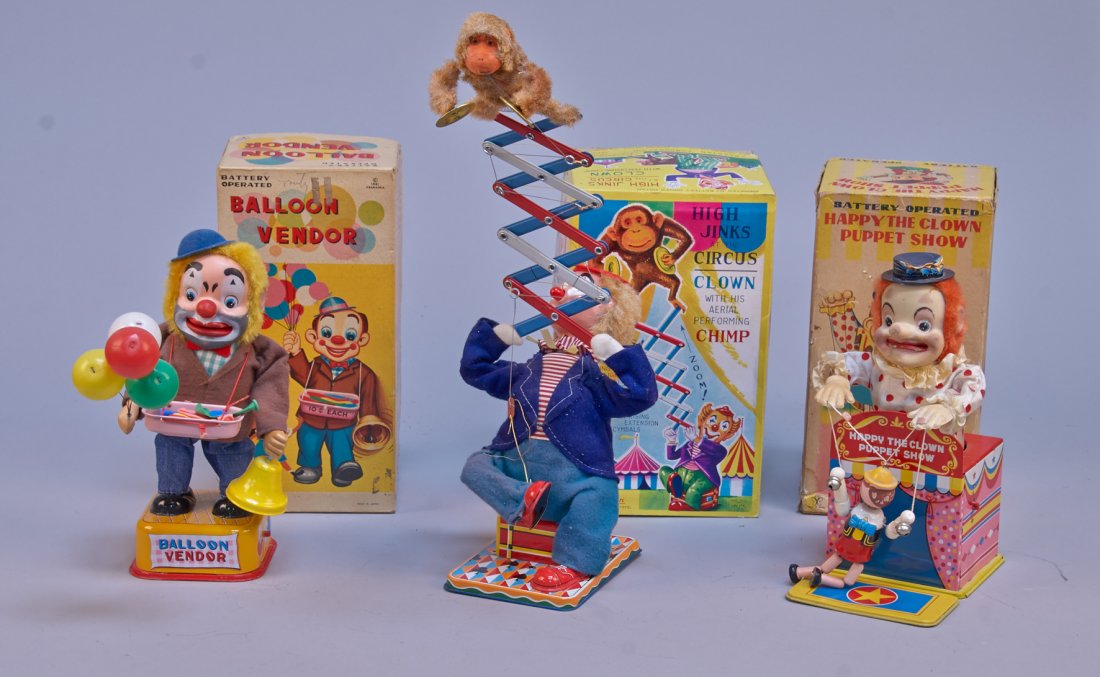 Lot of 3 - Vintage Misc. Made In Japan Clown Toys:: Lot of 3 - Vintage Misc. Made in Japan Clown Toys: 1 - Happy The Clown Puppet Show, litho. tin, battery op. - 11"h., 1 - High Jinks At The Circus Clown With His Aerial Performing Chimp, litho. tin, ba