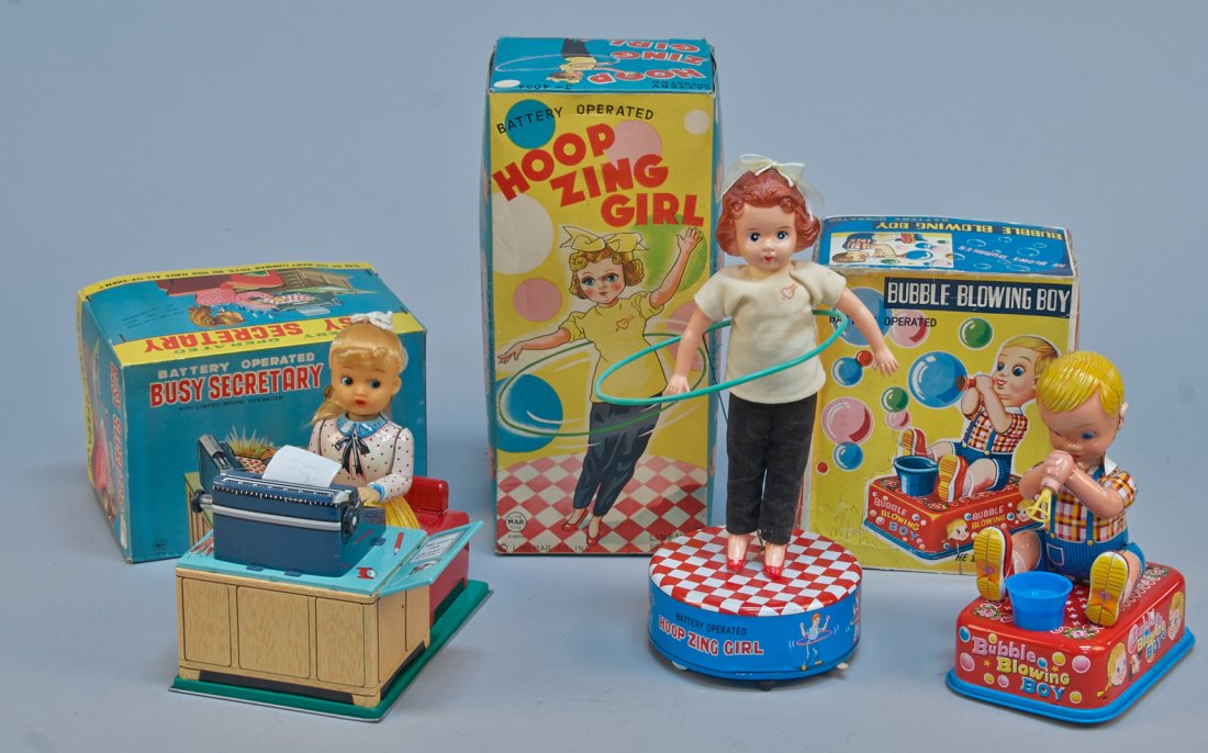 Lot of 3 - Vintage Misc. Made In Japan Toys:: Lot of 3 - Vintage Misc. Made in Japan Toys: 1 - Bubble Blowing Boy, litho. tin, battery op. - 7"h., 1 - Busy Secretary, litho. tin, battery op., her typewriter lights-up & moves - 7" x 7"h. & 1 - Hoo