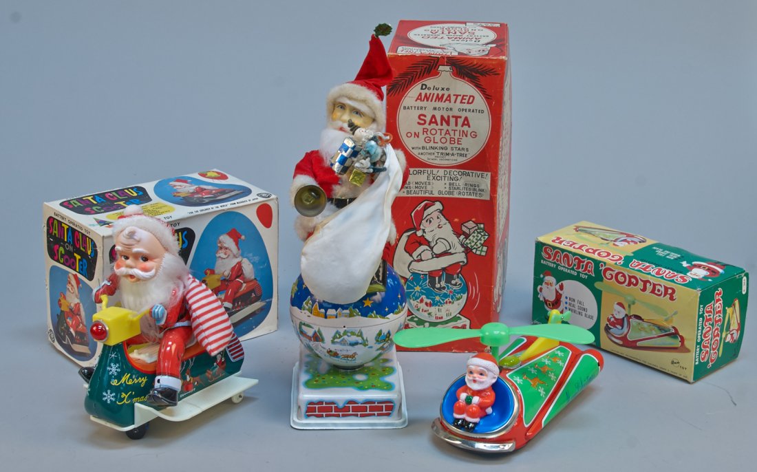 Lot of 3 - Vintage Made In Japan Santa Claus Toys:: Lot of 3 - Vintage Made in Japan Santa Claus Toys: 1 - Santa Claus On Scooter, litho. tin, battery op., multi-action - 7"h., 1 - Santa Copter, litho. tin, battery op. - 9" x 5"h. & 1 - Animated Santa 