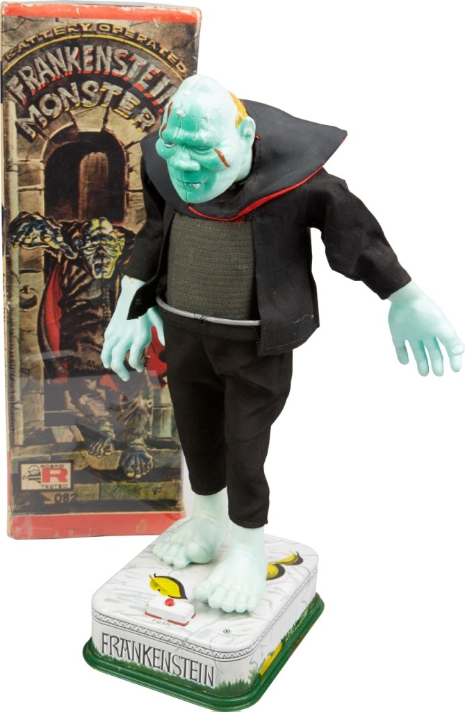 Mod Monster Blushing Frankenstein: Mod Monster Blushing Frankenstein, Made In Japan c1960s, litho. tin base, vinyl & cloth, battery op. - 13"h. He makes a walking motion, then drops his pants to reveal boxer shorts, realizing his pants