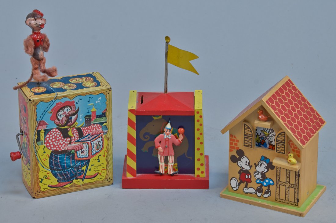 Lot of 3 - Vintage Misc. Music Box Wind-Up Toys:: Lot of 3 - Vintage Misc. Music Box Wind-Up Toys: 1 - Circus Clown Dancer, wood box w/ Swiss Musical Movement - 8"h., 1 - Street Organ Grinder w/ Dancing Monkey, Mattel, USA, c1951, litho. tin & 1 - Mi
