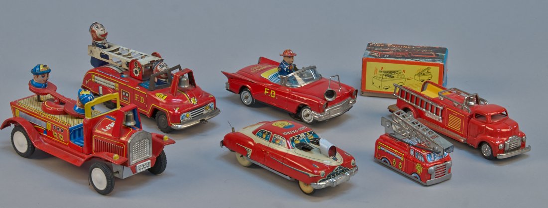 Lot Of 6 - Vintage Misc. Made In Japan Emergency Vehicl: Lot Of 6 - Vintage Misc. Made In Japan Emergency Vehicle Toys: 1 - F.D. Truck w/ 2- monkeys, litho. tin, friction - 8"l., 1 - Radio Patrol Car, litho. tin, friction - 7"l., 1 - Fire Dept. Truck w/ see