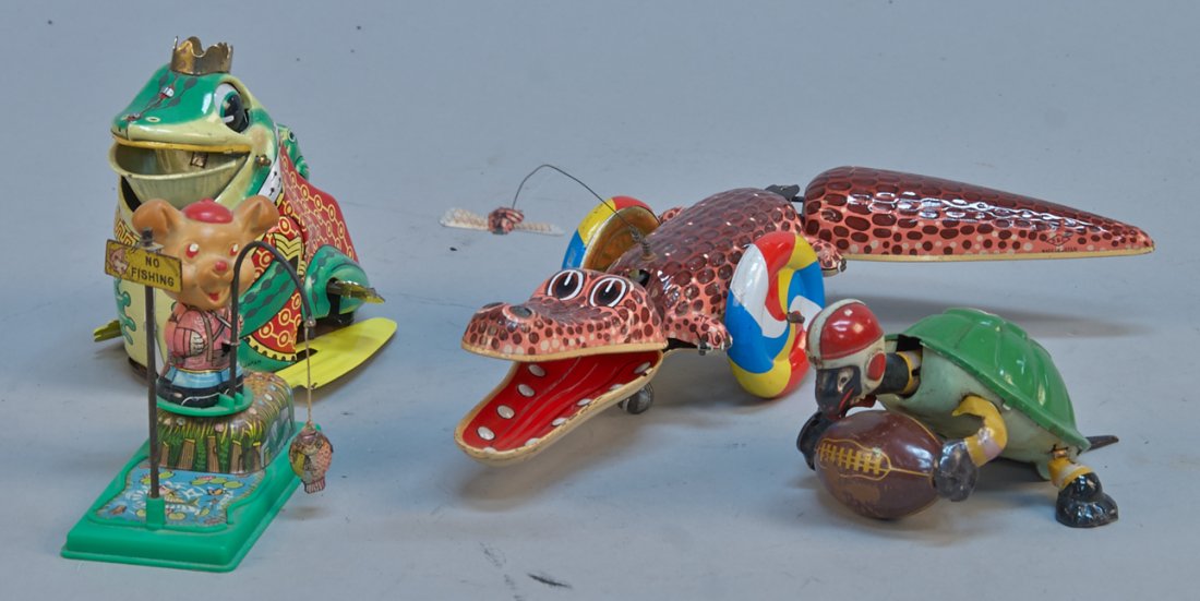 Lot Of 4 - Vintage Misc. Made In Japan Litho. Tin, Wind: Lot Of 4 - Vintage Misc. Made In Japan Litho. Tin, Wind-Up Animal Toys c1960s: 1 - alligator chasing fly w/ snapping jaw - 12"l., 1 - frog wearing crown w/ moving eyes & mouth - 5"h., 1 - turtle footb