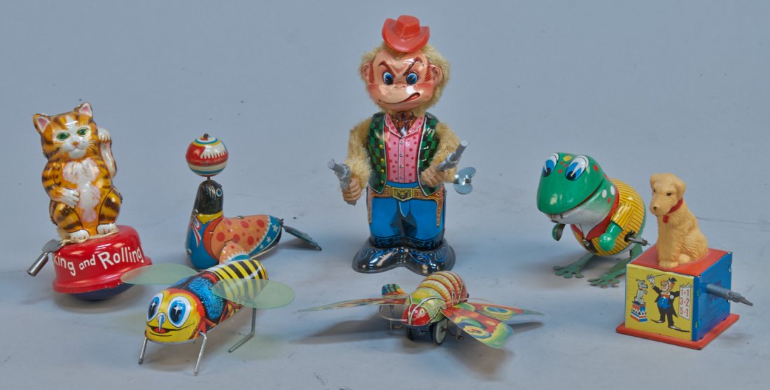 Lot of 7 - Vintage Misc. Litho. Tin Wind-Up Toys:: Lot of 7 - Vintage Misc. Litho. Tin Wind-Up Toys: 1 - Rex The Reckoning Dog, he can count to 20, Made In Germany - 4"h., 1 - Angry Monkey w/ 6-Shooters, Made In Japan - 6-1/2"h., 1 - Rocking and Rolli