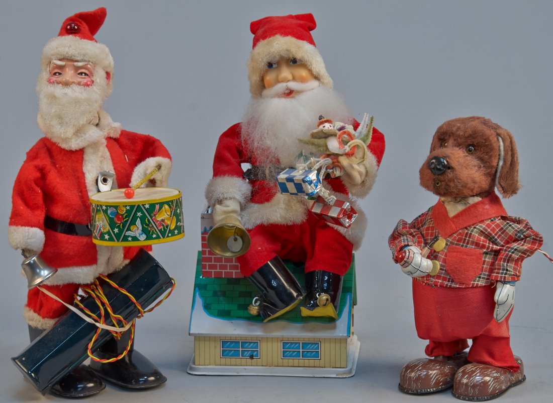 Lot of 3 - Vintage Misc. Made In Japan Toys:: Lot Of 3 - Vintage Misc. Made In Japan Toys: 1- Santa Claus on roof-top bank, c1960s, litho. tin, rubber, fabric, felt, battery op. - 12"h., 1- Santa Claus playing drum & ringing bell, litho. tin, fab