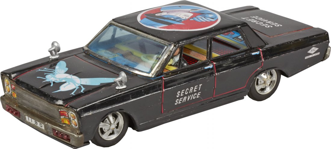Green Hornet - Secret Service Litho. Tin Car: Green Hornet - Secret Service Litho. Tin Car, Made In Japan, c1966, battery op. - 12"l. Makes siren noise, moves, rear tailpipes light-up, windshield has small damage, in great condition