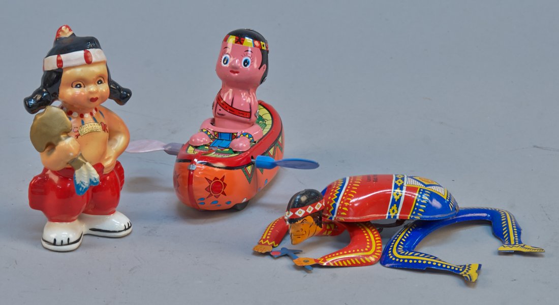 Lot of 3 - Vintage Misc. Indian Figure Toys:: Lot of 3 - Vintage Misc. Indian Figure Toys: 1- Chief crawling on belly, Ohio Art, USA, c1940s, litho. tin, wind-up - 8"l., 1- Paddling in canoe, Made in Japan, litho. tin, friction - 5" x 4-1/2"h. & 