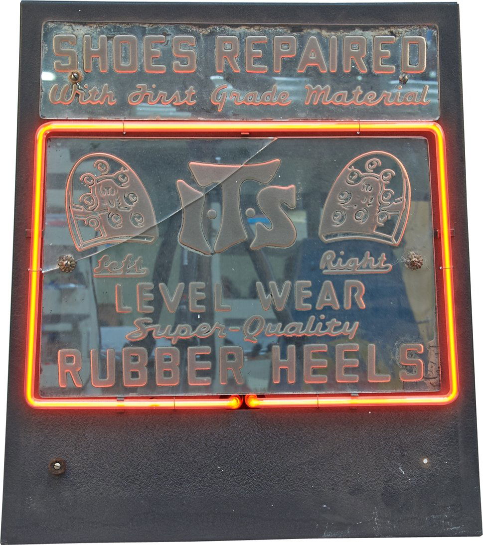 I.T.S. Rubber Heels Glass Mirror Neon Light-Up Sign: I.T.S. Rubber Heels Glass Mirror Neon Light-Up Sign, Reverse etched glass on metal w/ neon border, "Shoes Repaired With First Grade Material" featuring picture of heels in glass, Crack in glass - 17"