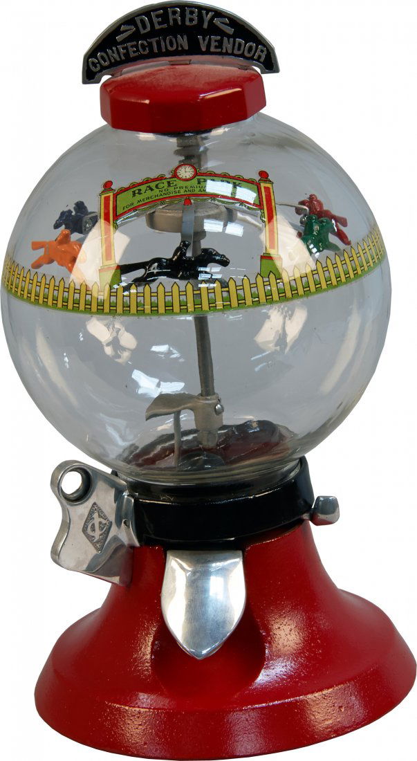 1 Cent R.D. Simpson Derby Confection Vendor Countertop: 1 Cent R.D. Simpson Derby Confection Vendor Countertop Gumball Vending Machine w/ "Derby Confection Vendor" top sign, "Race Park" decal, Horse race wheel inside globe rotates, Red cast-iron base, Good