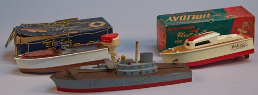 Lot of 3 - Vintage Misc. Toy Boats:: Lot of 3 - Vintage Misc. Toy Boats: 1 - The Holiday Speed Boat Fleet Line #652, battery op. w/ O.B. (fair), 1 - Electric Model Boat, battery op. w/ O.B. (fair) & 1 - Keystone US Aircraft C-12 Navy Boa
