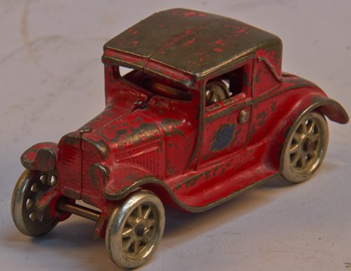 Early Arcade Cast-Iron Model 'A' Coupe Rumble Seat No.: Early Arcade Cast-Iron Model 'A' Coupe Rumble Seat No. 116 c1928, has original decal on door - 5"l
