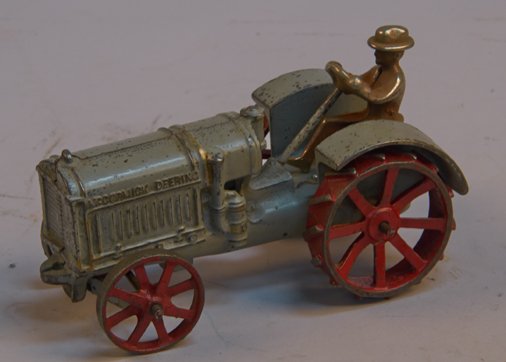 Early McCormick-Deering Cast-Iron Tractor 10-20 c1925: Early McCormick-Deering Cast-Iron Tractor 10-20 c1925, by Arcade w/ driver - 7-1/4"l