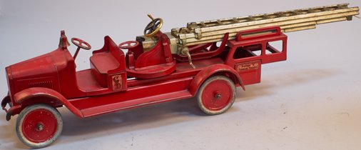 Vintage Buddy "L" Cast-Iron Hydraulic "Aerial Truck" Fi: Vintage Buddy "L" Cast-Iron Hydraulic "Aerial Truck" Fire Engine c1933 w/ extending ladders, original firebell, ladder lift moves up, rope to extend ladders is broken (needs a little work) - 40"l