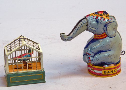 Lot of 2 - Vintage Misc. Litho. Tin Toys:: Lot of 2 - Vintage Misc. Litho. Tin Toys: 1 - J. Chein, USA., Elephant mechanical coin bank c1940s - 5"h. & 1 - Wind-up bird in cage, stamped "J.A.J. - Made in Germany", works