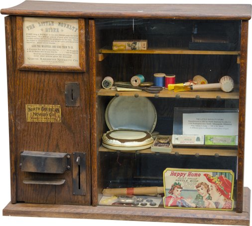 5 Cent "The Little Novelty Store" Mystery Countertop: 5 Cent "The Little Novelty Store" Mystery Countertop Trade Stimulator by North American Novelty Co. Minneapolis, Minn., Includes prizes (lockets, corn cob pipes, pocket watches, etc.) & original prize