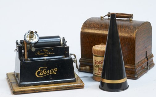 Early Edison Cylinder Phonograph w/ Horn: Early Edison Cylinder Phonograph w/ Horn, Model C, Has hand-crank. This is a small portable version w/ the lid & handle, Comes w/ a Jones & Murray Edison cylinder record. Excellent condition - 9" x 7"