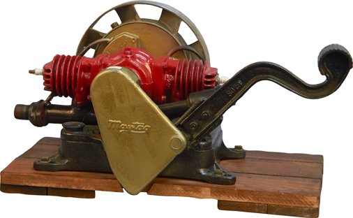 Red Maytag Hit & Miss Engine on Wood Block: Red Maytag Hit & Miss Engine on Wood Block, Maytag Company, Newton, Iowa, by Eisemann Magneto Corporation, Brooklyn, N.Y., Pre-electricity washing machine motor