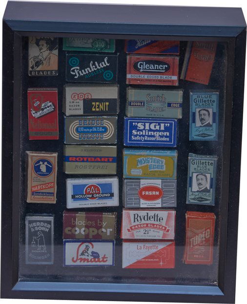 Lot of Early Razor Blade Packages in Display Frame: Lot of Early Razor Blade Packages in Display Frame, Including King Gillette Blue Blades, Don Juan, Sigi Solingen, Mystery Edge, etc., Glass & wood shadow box frame - 9" x 10"