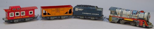 Lot Of 4 - Vintage Unique Art, Litho. Tin "Unique Lines: Lot Of 4 - Vintage Unique Art, Litho. Tin "Unique Lines" Train Cars, Including: wind-up locomotive No. 742 w/ tender car, dump car & caboose car - each approx. 7"l