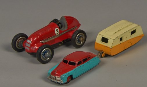 Lot of 3 - Vintage Foreign Made Tin Toys:: Lot of 3 - Vintage Foreign Made Tin Toys: 1 - Schuco "Studio 1050" Race Car c1950's, Made In US Zone Germany - approx. 6"l., 1 - Dinky Toys "Hudson Sedan", Made In England - approx. 5"l. & 1 - Dinky T
