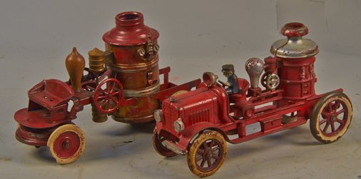 Lot of 2 - Vintage Misc. Fire Engine Pumper Trucks:: Lot of 2 - Vintage Misc. Fire Engine Pumper Trucks: 1 - Kingsbury, iron & steel, clockwork w/ white rubber tires - approx. 11"l. & 1 - cast-iron w/ bell on bottom, may be Hubley - approx. 12"l