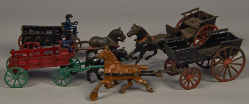 Lot of 4 - Vintage Misc. Cast-Iron 1-Horse Team Carriag: Lot of 4 - Vintage Misc. Cast-Iron 1-Horse Team Carriages: 1 - "COAL" w/ driver & mini pieces of coal - 10"l., 1 - red & green stake side wagon w/ driver - approx. 11"l., 1 - black w/ red spoke wheels